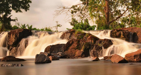 Waterfall in the forest at sunset. Waterfall in Thailand.の写真素材
