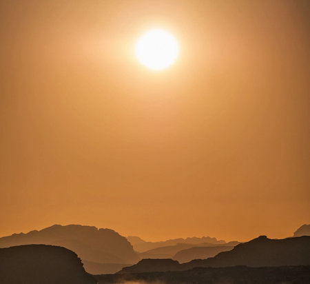 sunset in the desert of jordan the beautiful wonder of the worldの写真素材