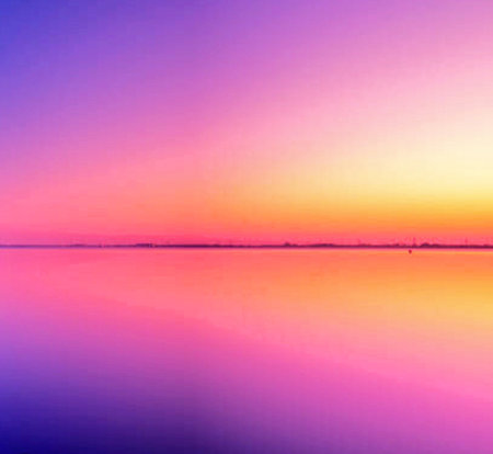 Sunset on the lake with pink and purple colors. Beautiful natural background.の写真素材