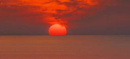 Sunset over the sea. 3d render. Sunset over the sea.の写真素材