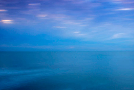 Abstract background of the sea and blue sky. Motion blur effect.の写真素材