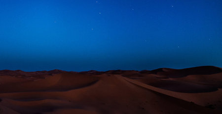 Dunes in the Sahara desert at night. Africa.の写真素材