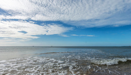 Beautiful sea landscape in the morning with blue sky and white cloudsの写真素材