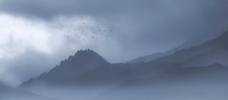 Mountain landscape with fog and flock of birds. Panorama.の写真素材