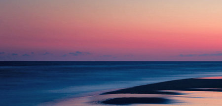 Sunset on the beach of the Baltic Sea. Long exposure.の写真素材