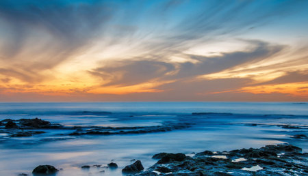 Beautiful seascape at sunset. Dramatic sky over the sea.の写真素材