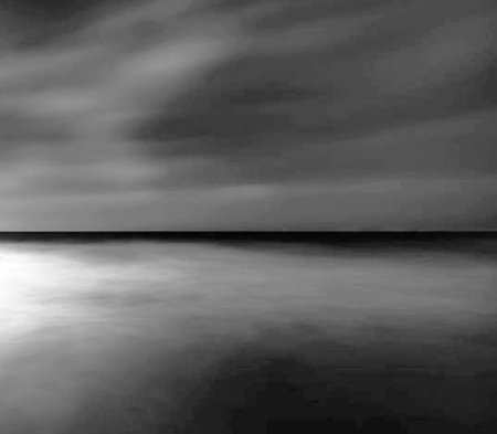 Black and white abstract background with water reflections on the sea surface.の写真素材