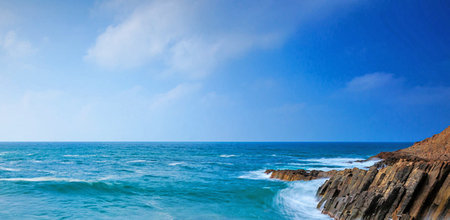 Beautiful seascape with blue sky. Panoramic image