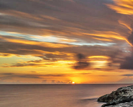 Sunset over the sea. Seascape with clouds and sky