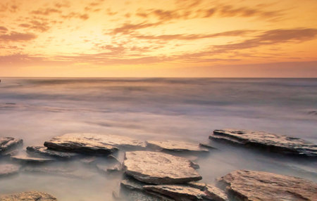 Beautiful sunset over the sea in the evening. Long exposure.の写真素材