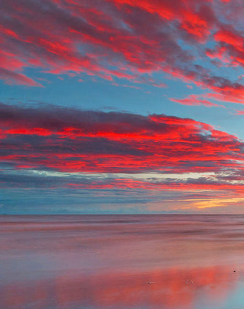Beautiful sunset over the sea. Colorful sky at sunset.の写真素材