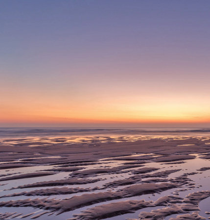 beautiful sunset over the sea in winter, Liepaja, Latviaの写真素材