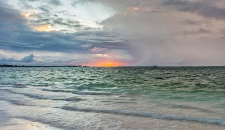 Sunset on the beach of the island of Zanzibarの写真素材