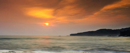 Sunset on the beach in Bali, Indonesia. Panoramaの写真素材