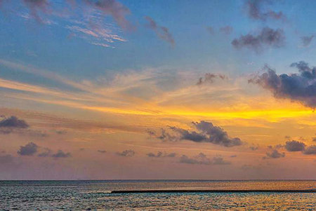 Sunset at the beach of the island of Zanzibar