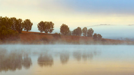 Foggy morning on the river. Landscape with fog.の写真素材