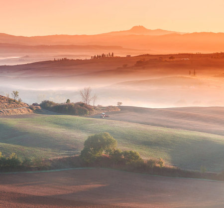 Tuscany landscape at sunrise, Italy. Tuscany is a region in the south of Italy.の写真素材