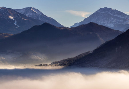 Mountain landscape with fog in the morning.の写真素材