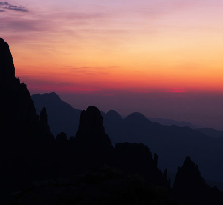 Beautiful sunset at the peak of the mountain in Huangshan, China