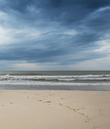 Stormy weather on the beach of the Baltic Sea, Poland.