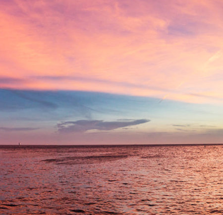 Beautiful sunset over the sea. Colorful sky. Nature background.の写真素材