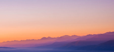 Sunrise over the mountains. Panoramic view of the mountains.の写真素材