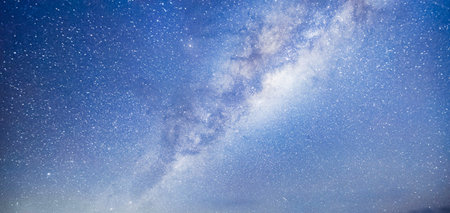 Night sky with stars and milky way. Panoramic image.