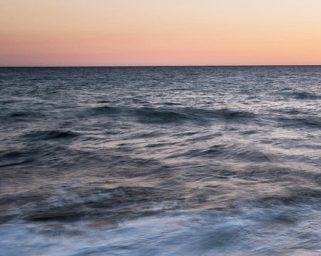 beautiful sunset on the sea, waves and sky, nature seriesの写真素材
