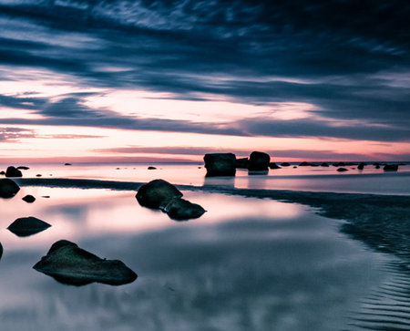 Beautiful seascape with rocks in the water at sunset.の写真素材