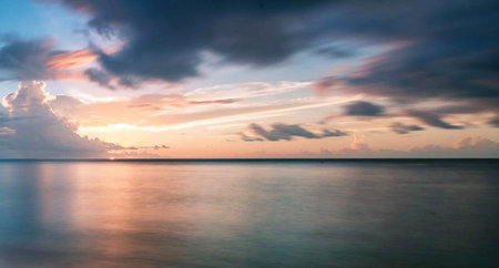 Beautiful sunset over the sea. Beautiful seascape with cloudsの写真素材