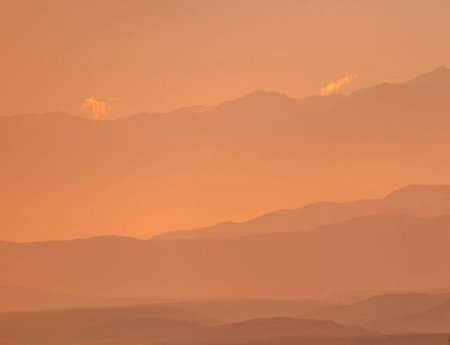 Sunset with mountains in the background