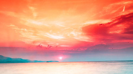 Tropical beach at beautiful sunset - Vintage filter and boost up color processingの写真素材