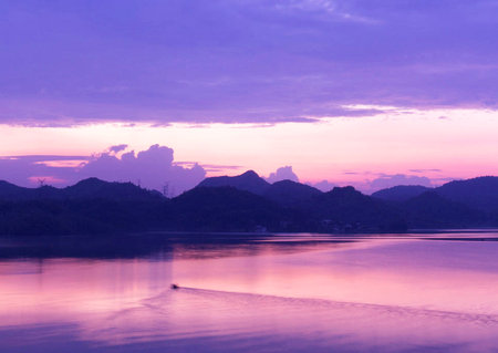 Beautiful sunset at the lake, Khao Sok National Park, Thailandの写真素材