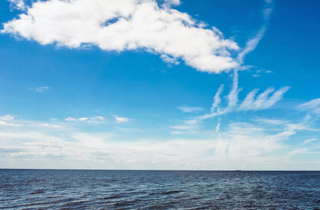 Beautiful seascape with clouds and blue sky. Nature backgroundの写真素材