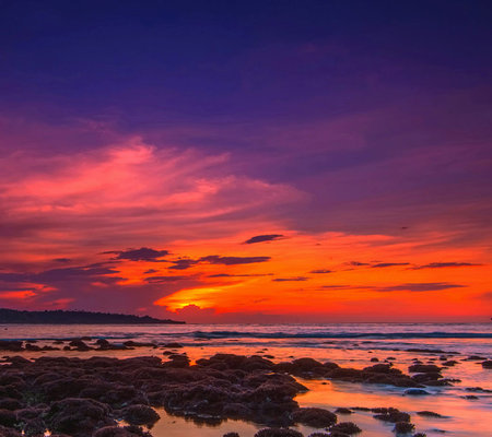 Beautiful sunset on the beach in the evening. Colorful skyの写真素材