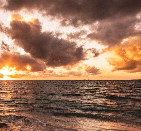 Sunset over the sea in the tropics. Beautiful seascape.