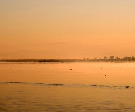 Sunrise on the Mekong River in Vietnam. The Mekong River is one of the largest rivers in the world.の写真素材