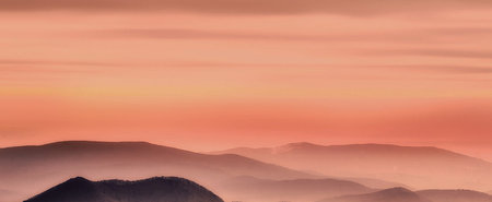 Panoramic view of the Carpathian mountains at sunset.の写真素材