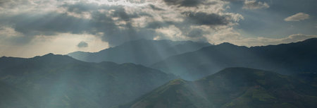 Sunset over the mountains in Yunnan province, China. Panorama.