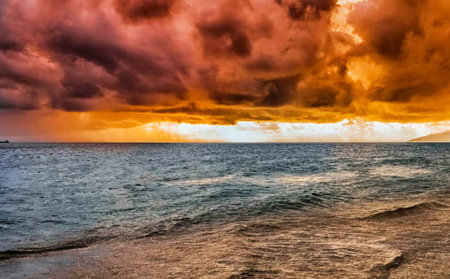 Dramatic sunset over the sea in the tropics. Toned.の写真素材