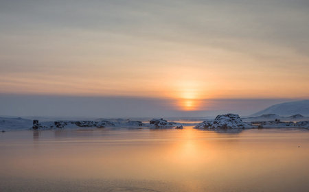 Beautiful sunset over the sea in winter. Iceland, Europe.の写真素材