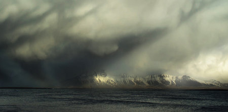 Storm over the fjord in Iceland. Dramatic sky.の写真素材