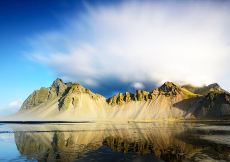 Beautiful landscape of Iceland. Reflection of mountains in water.の写真素材
