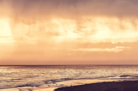 Sunset over the Baltic Sea in Kolobrzeg, Polandの写真素材