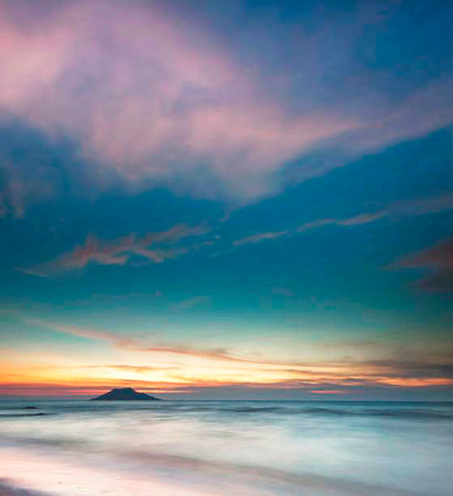Beautiful seascape at sunset. Colorful sky with clouds.