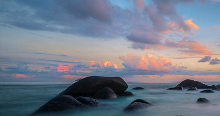 Tropical beach with granite rocks at sunset, Seychelles