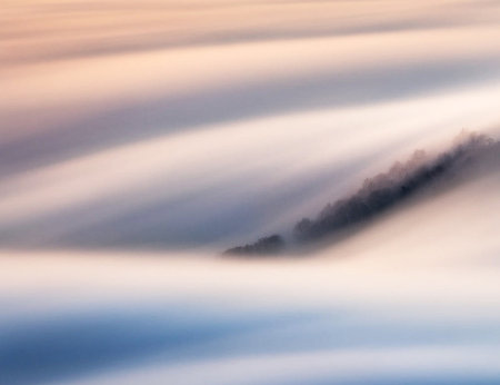 Morning fog in the mountains. Morning fog in the mountains. Morning fog in the mountains.の写真素材