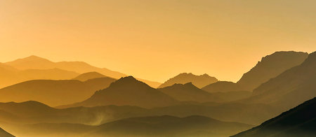 Sunrise in the mountains. Panoramic view of the mountains.の写真素材