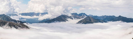 Panoramic view of clouds in the mountains. Caucasus, Russia