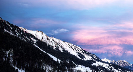 Sunset in the mountains. Beautiful winter landscape in the mountains.の写真素材